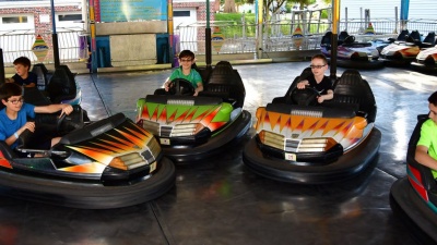 What kind of energy can be transferred to other objects through collisions like bumper cars?